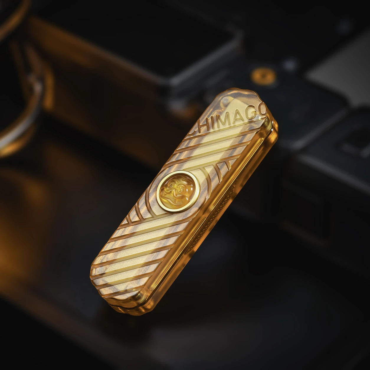 Hada Mechanical Fidget Slider – PEI, PEEK & Titanium EDC Toy – Amber PEI variant