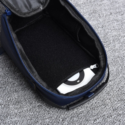 Open EDC organizer bag showing hook-and-loop interior and zip pocket