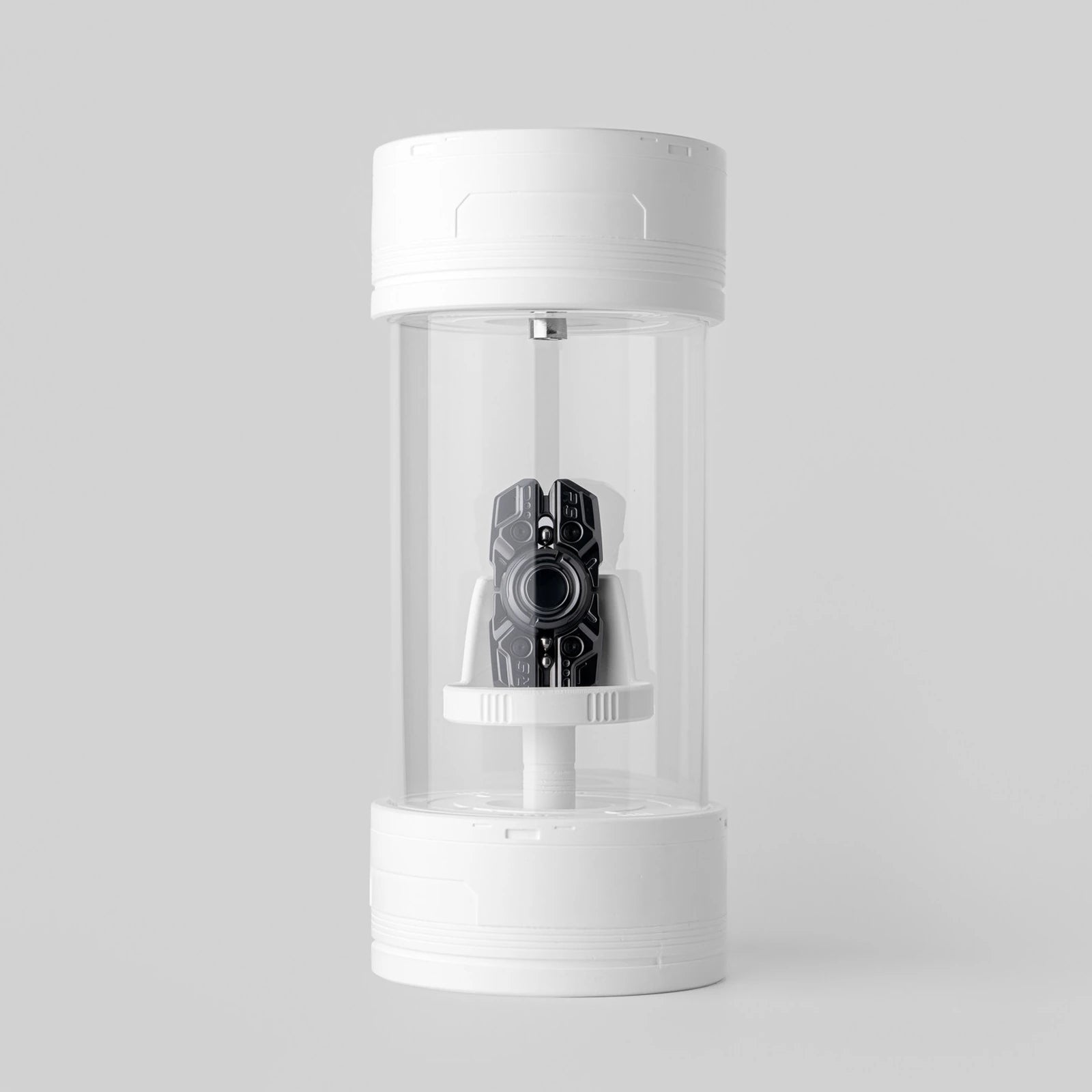 Glass dust-cover display case with a black collectible example