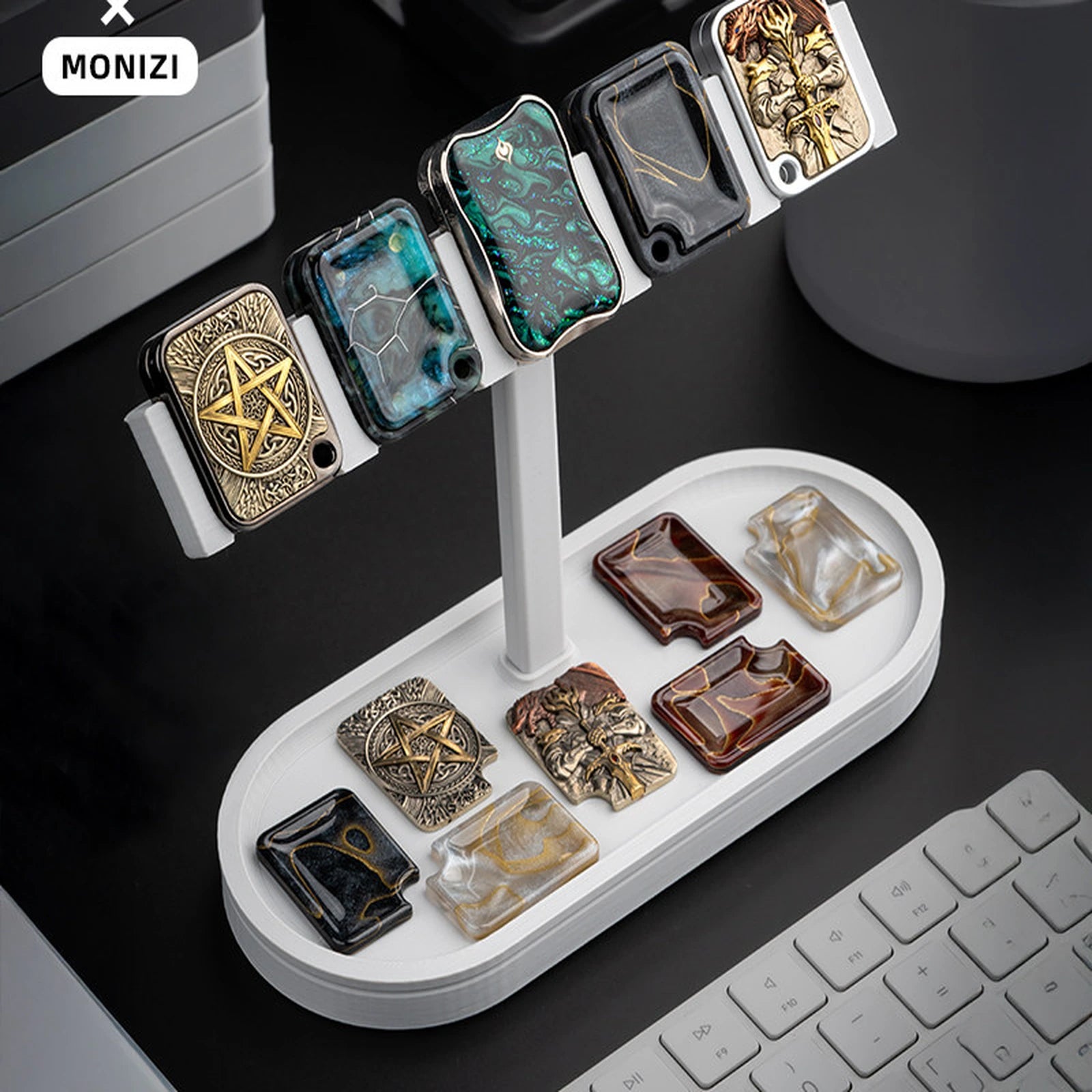 Light gray pegboard organizer with modular trays for collectible desk items