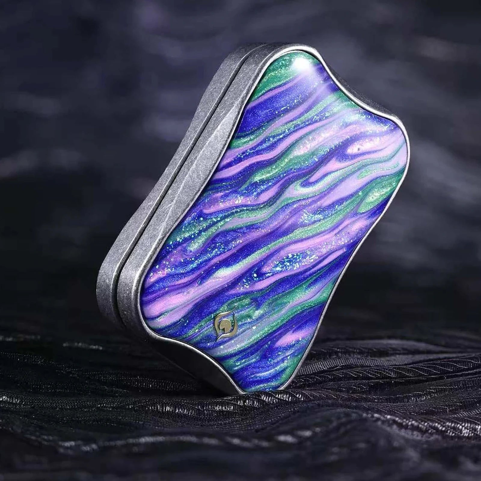 Summer Solstice metal fidget slider in blue green and purple