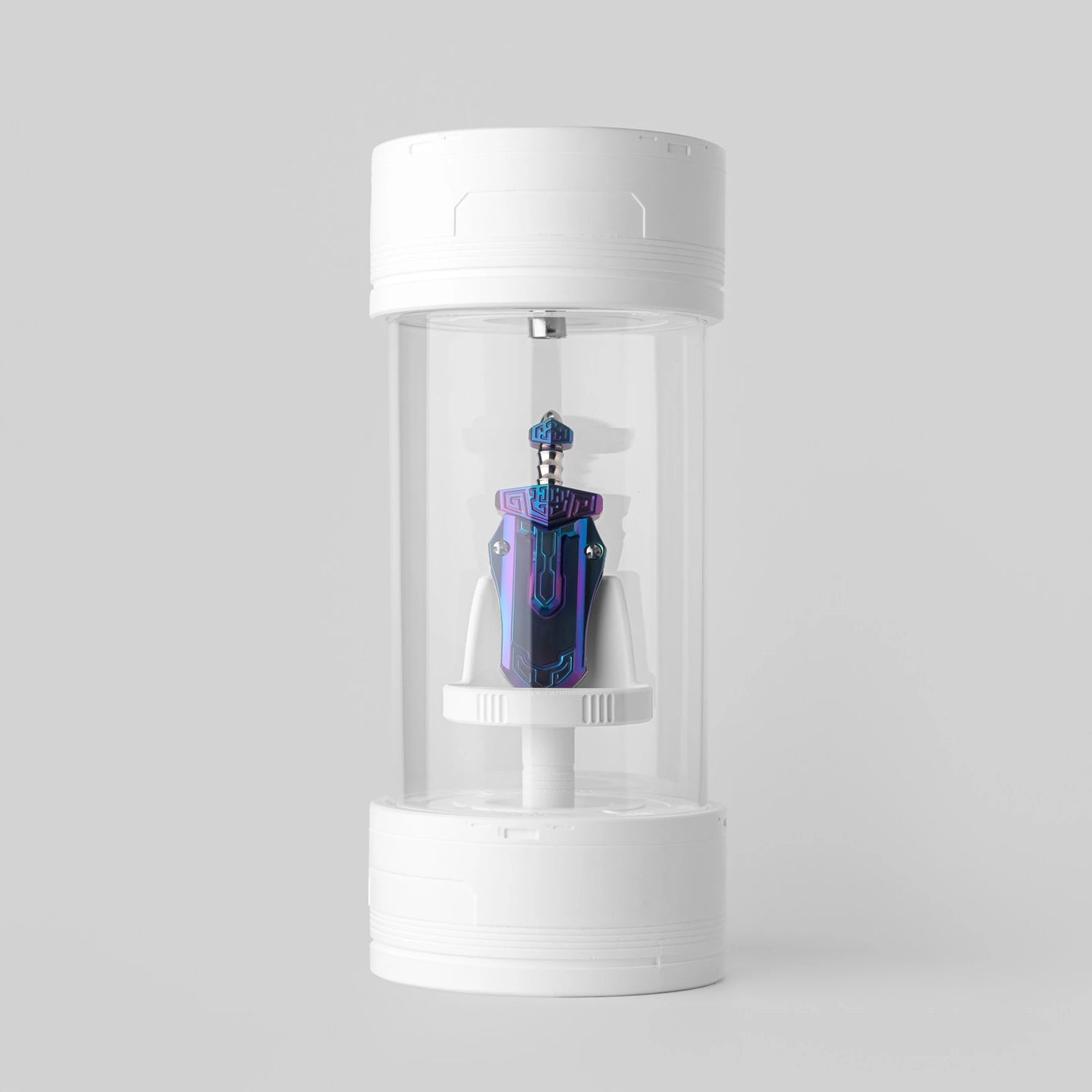 Tall collectible example displayed inside the clear cylindrical case