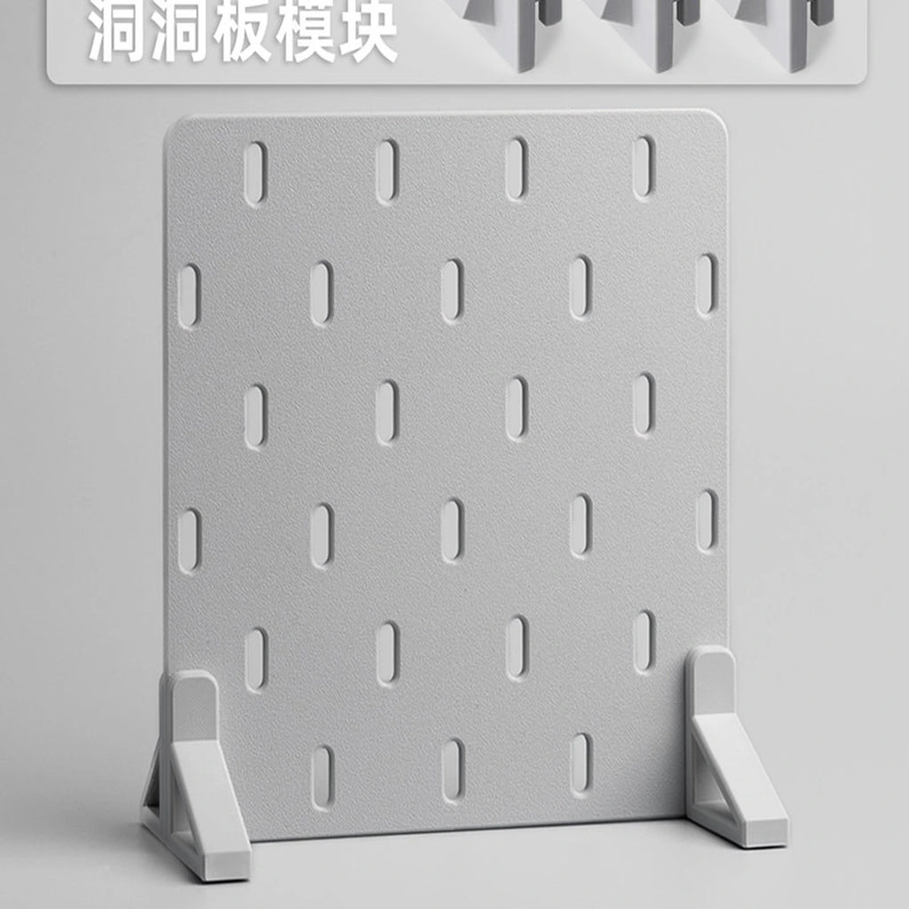 Light gray freestanding pegboard kit with three slotted panel sections