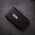 Black small fidget toy storage case with molded hard-shell exterior