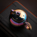 Heat-colored zirconium alloy ratchet fidget toy variant