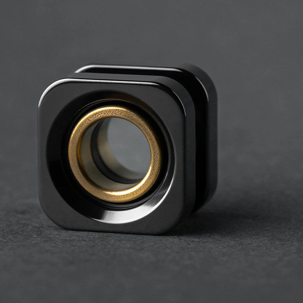 Polished zirconium square bead with brass inner ring