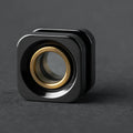 Polished zirconium square bead with brass inner ring