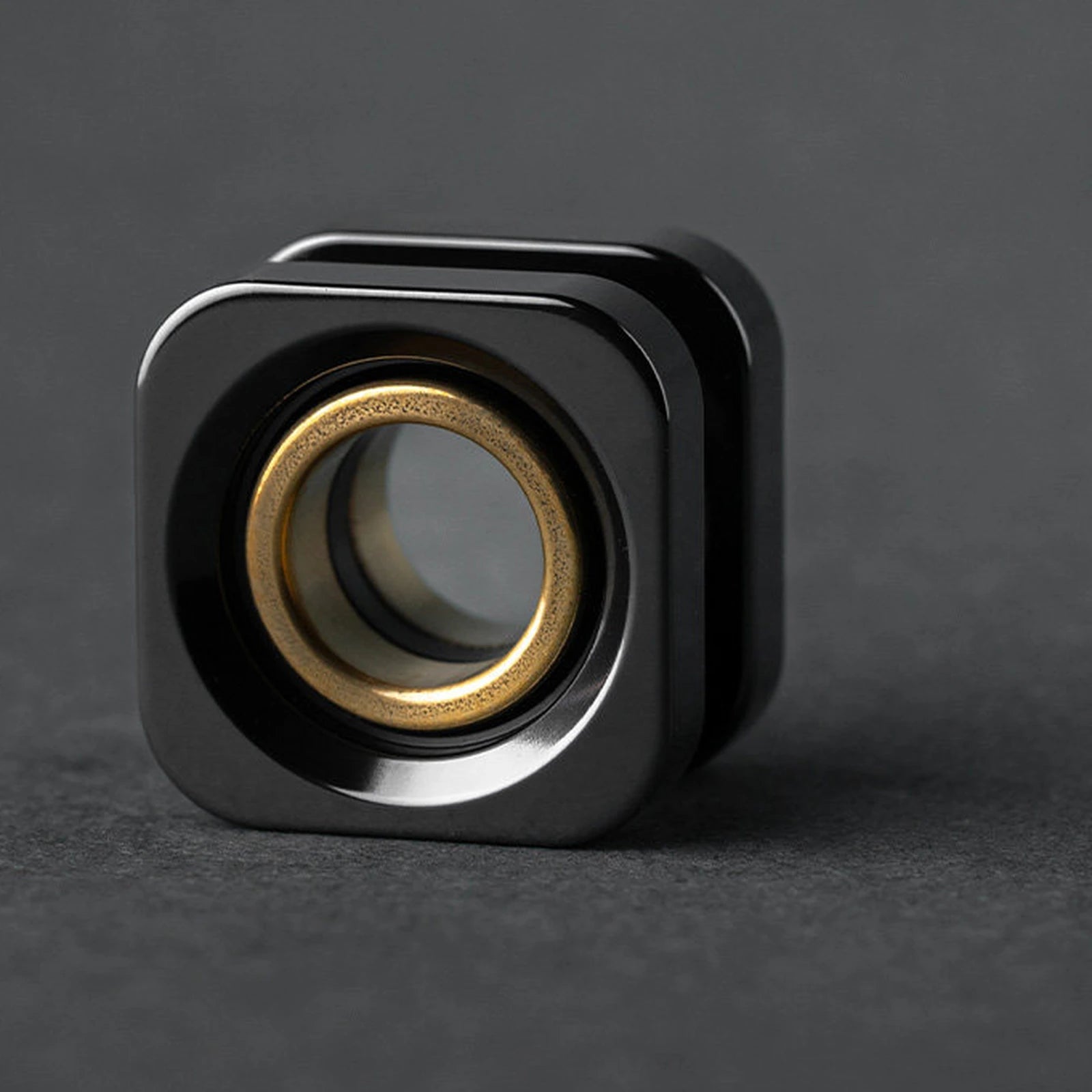 Polished zirconium square bead with brass inner ring