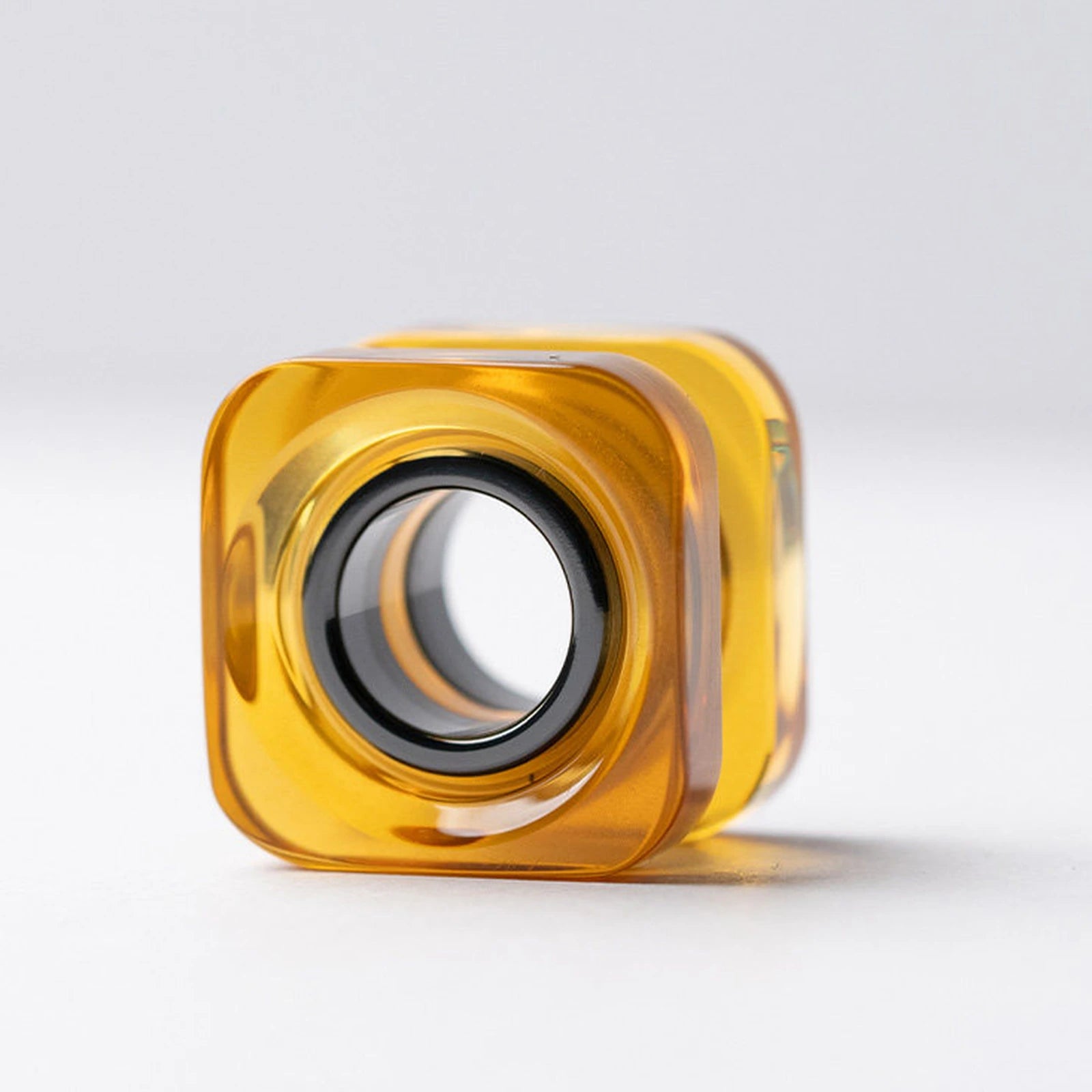 Amber PEI square bead with polished zirconium inner ring