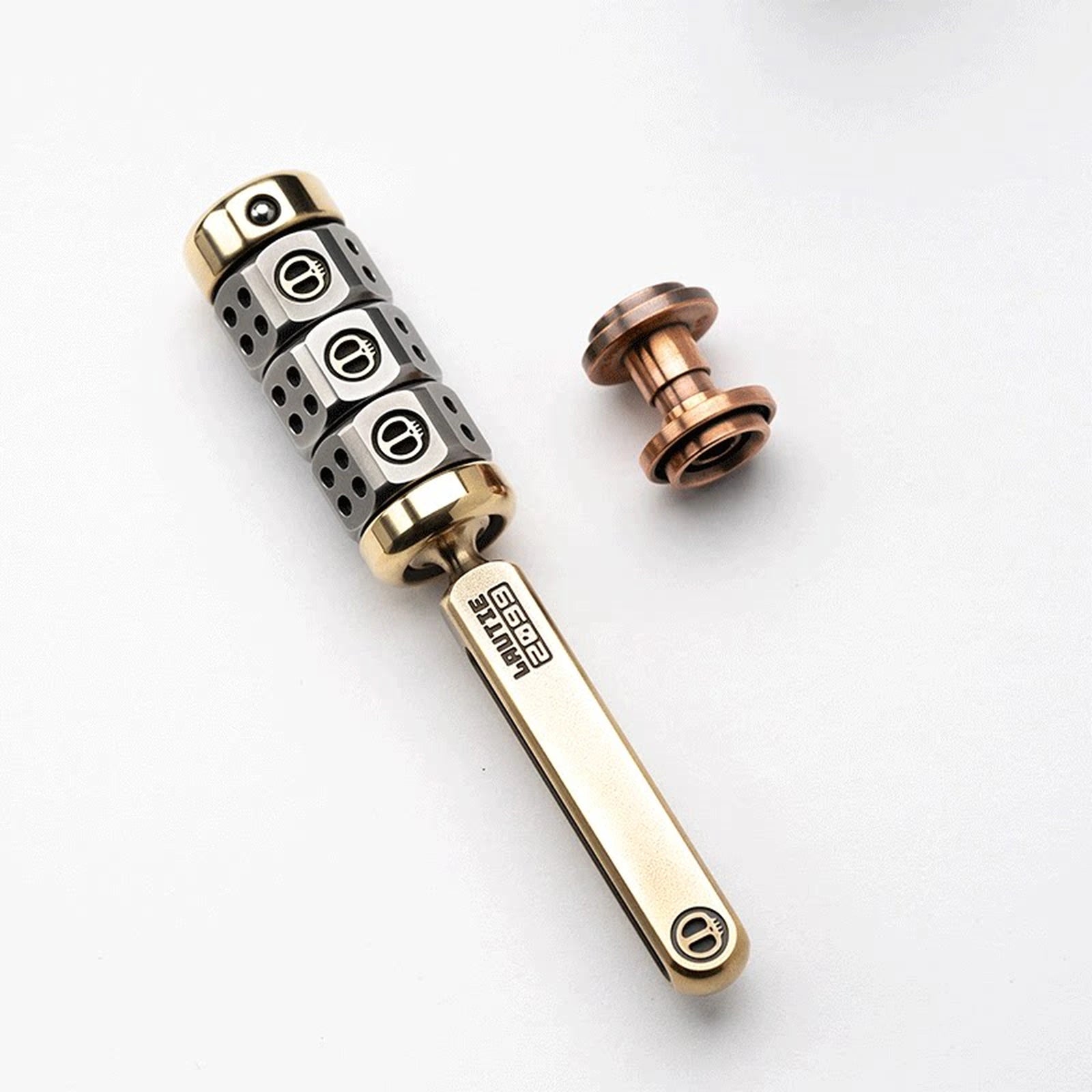 Magnetic ratchet fidget toy in handle set / brass + steel / copper button configuration