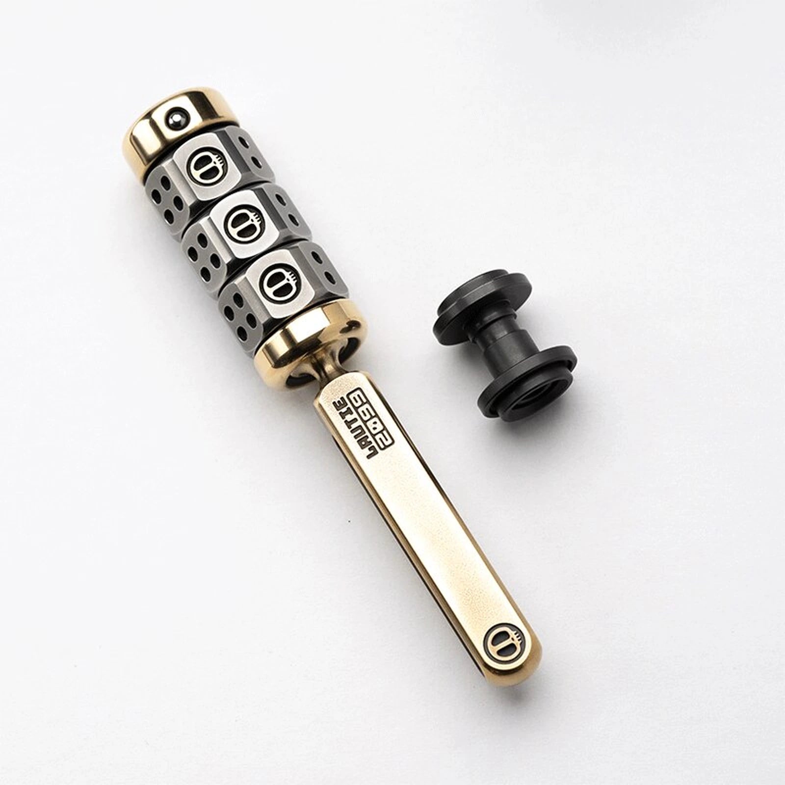 Magnetic ratchet fidget toy in handle set / brass + steel / zirconium button configuration
