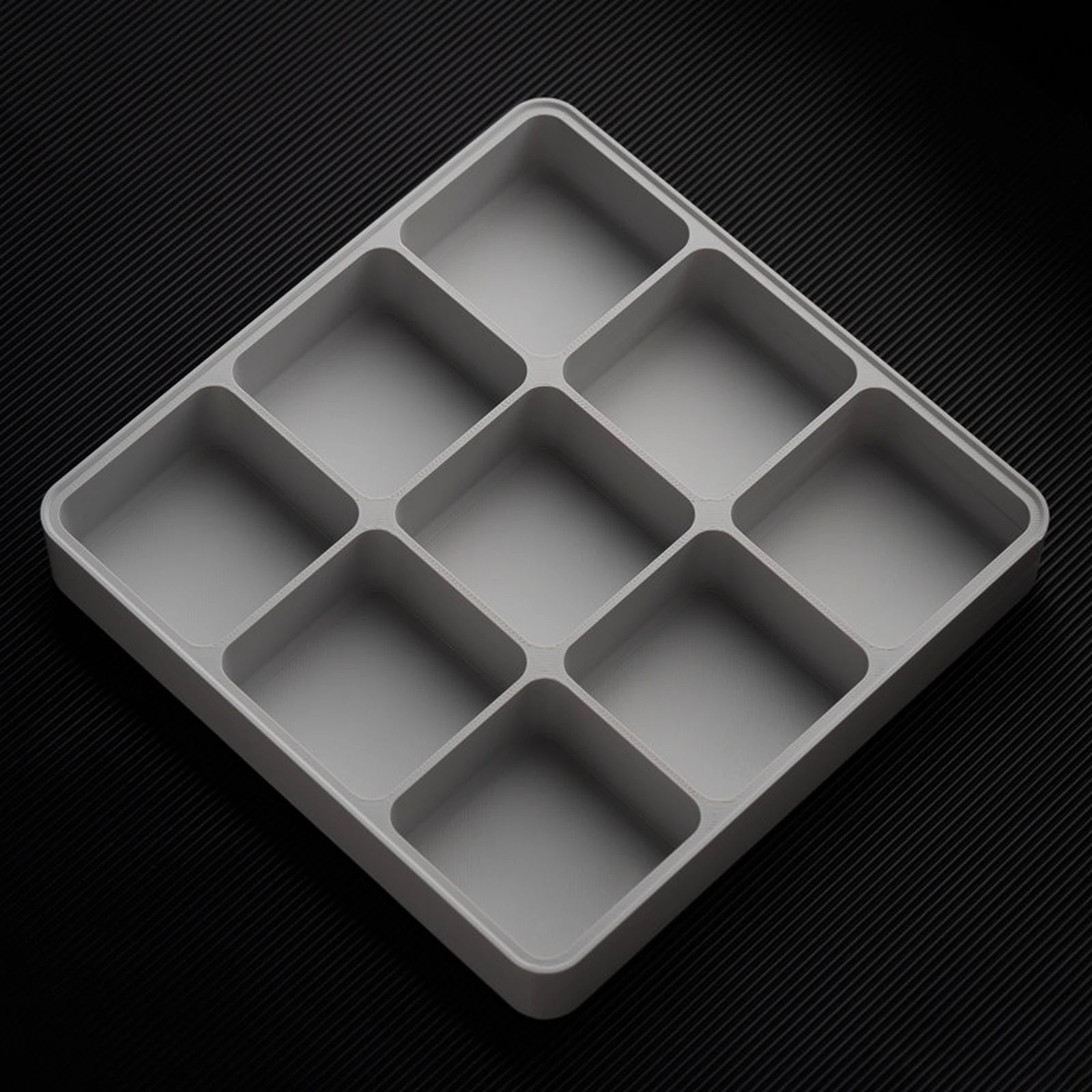 Light Gray stackable organizer tray with raised 9 compartments layout