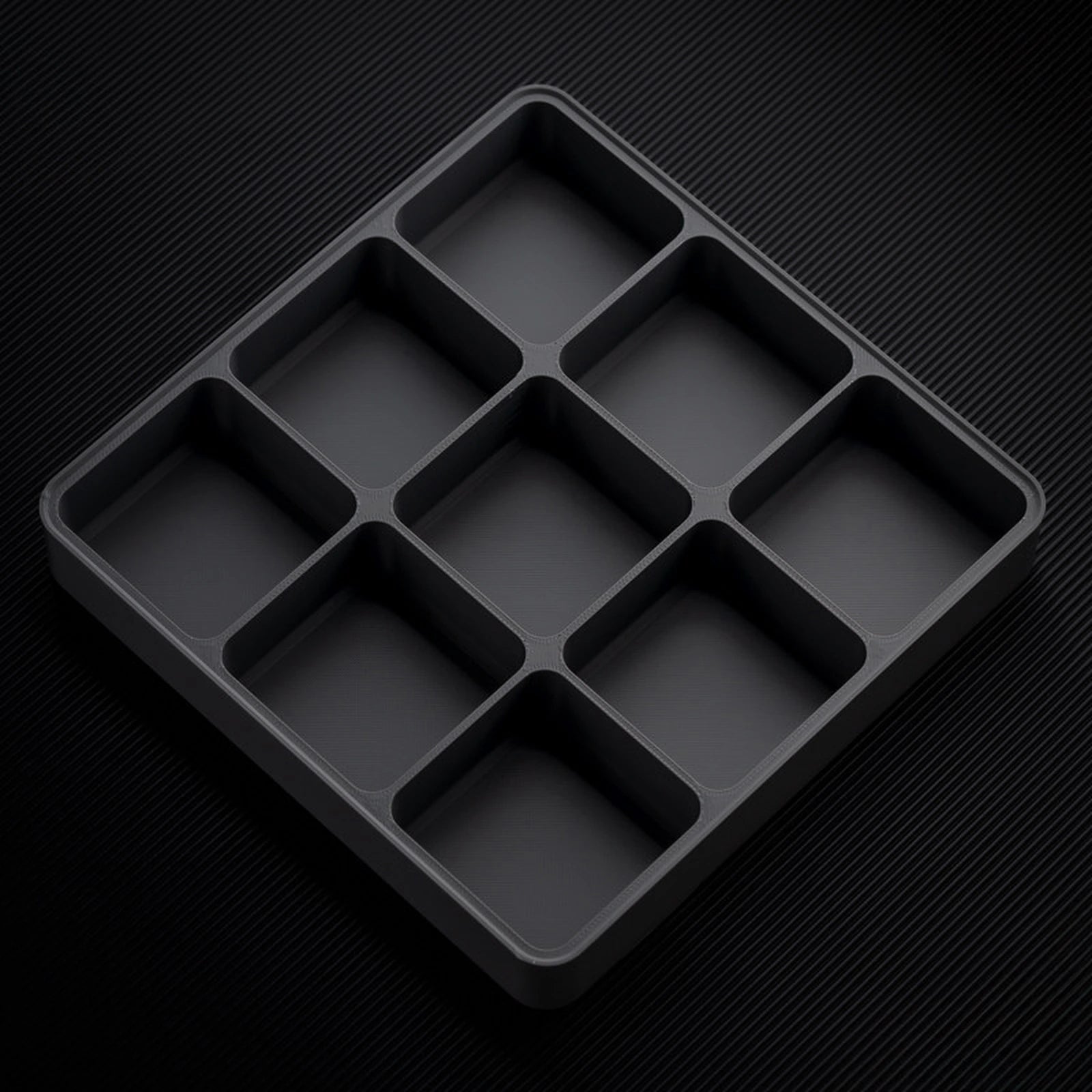 Dark Gray stackable organizer tray with raised 9 compartments layout