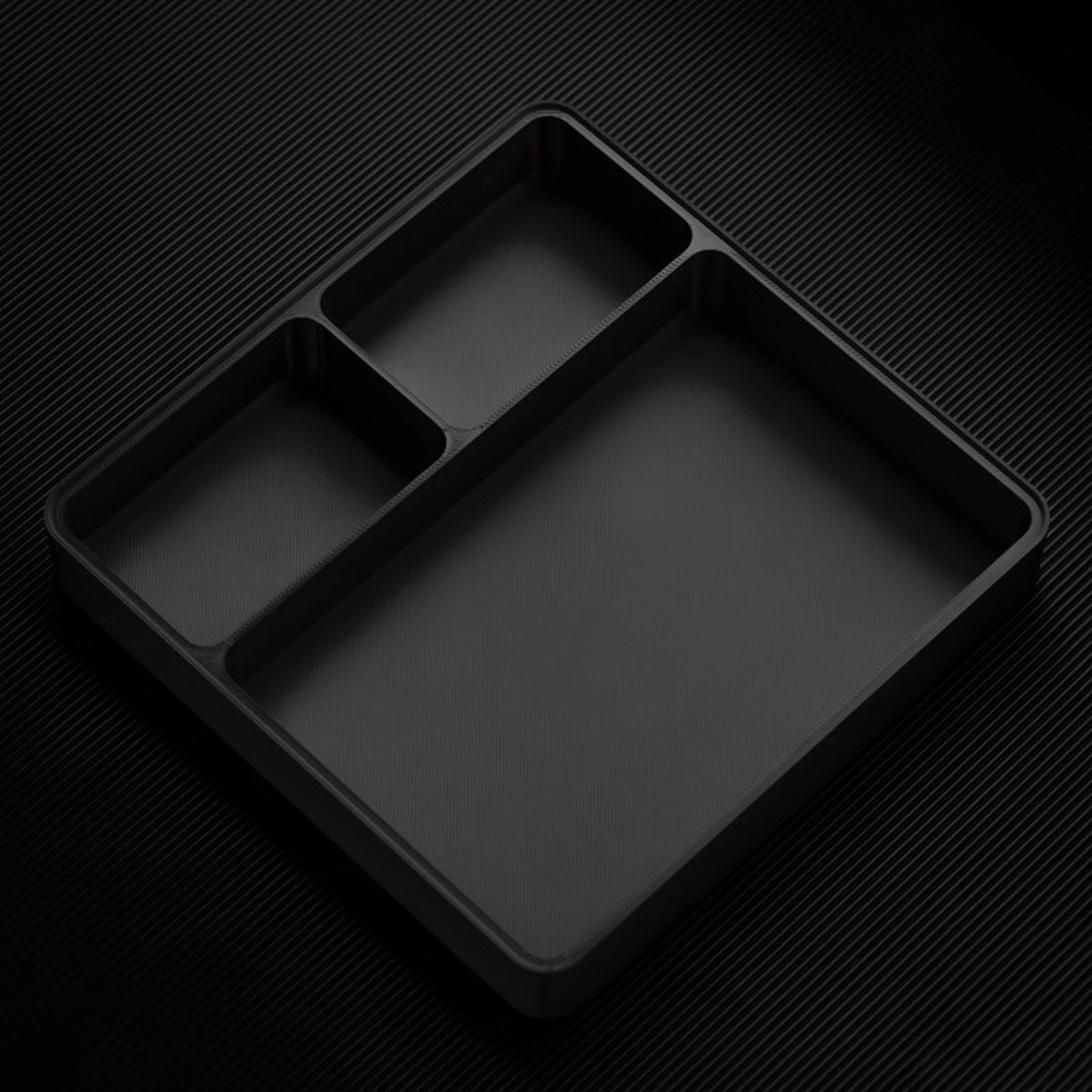 Black stackable organizer tray with raised t layout layout