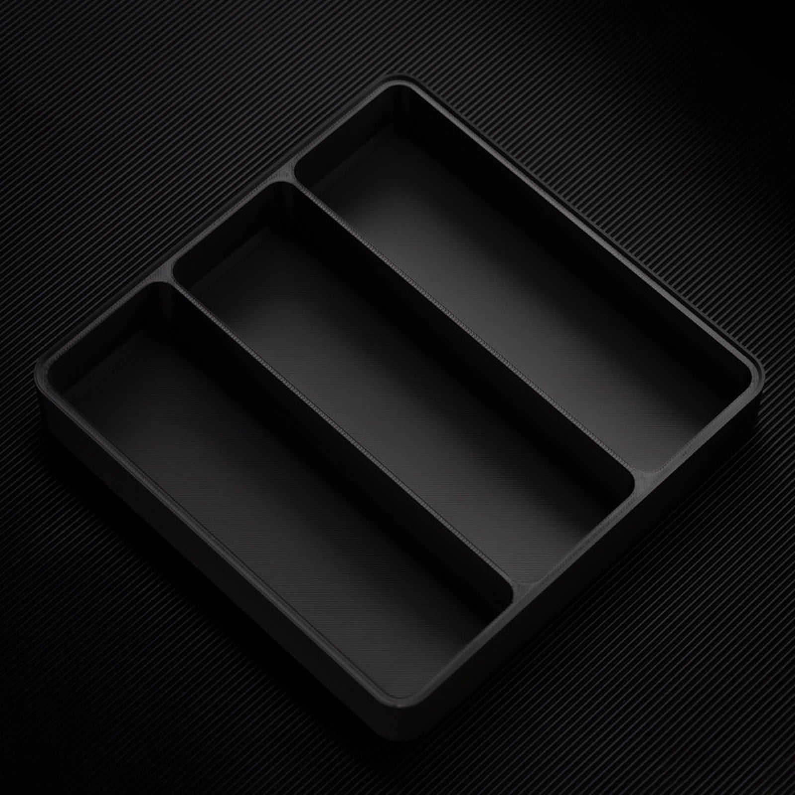 Black stackable organizer tray with raised 3 channels layout