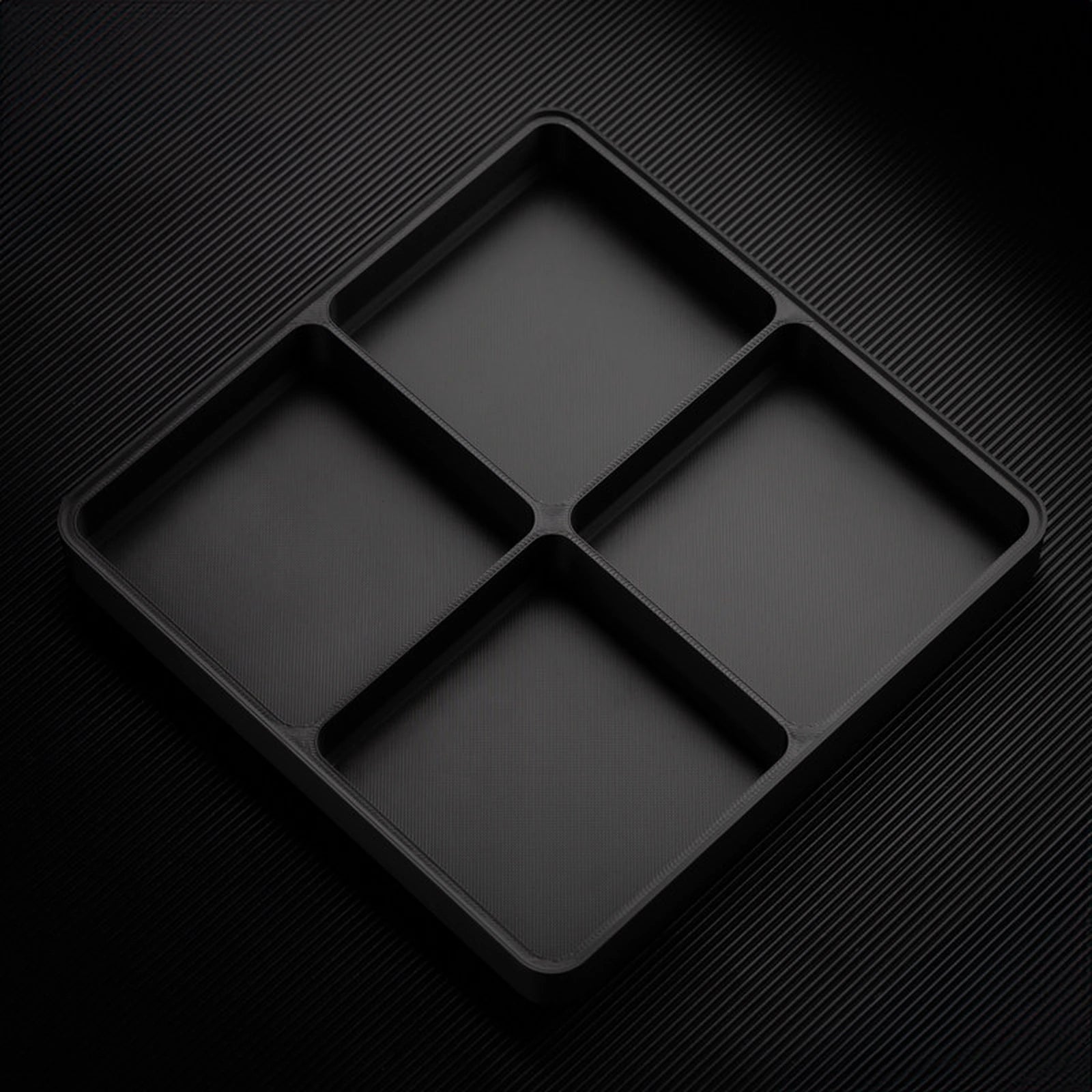 Black stackable organizer tray with 4 compartments layout