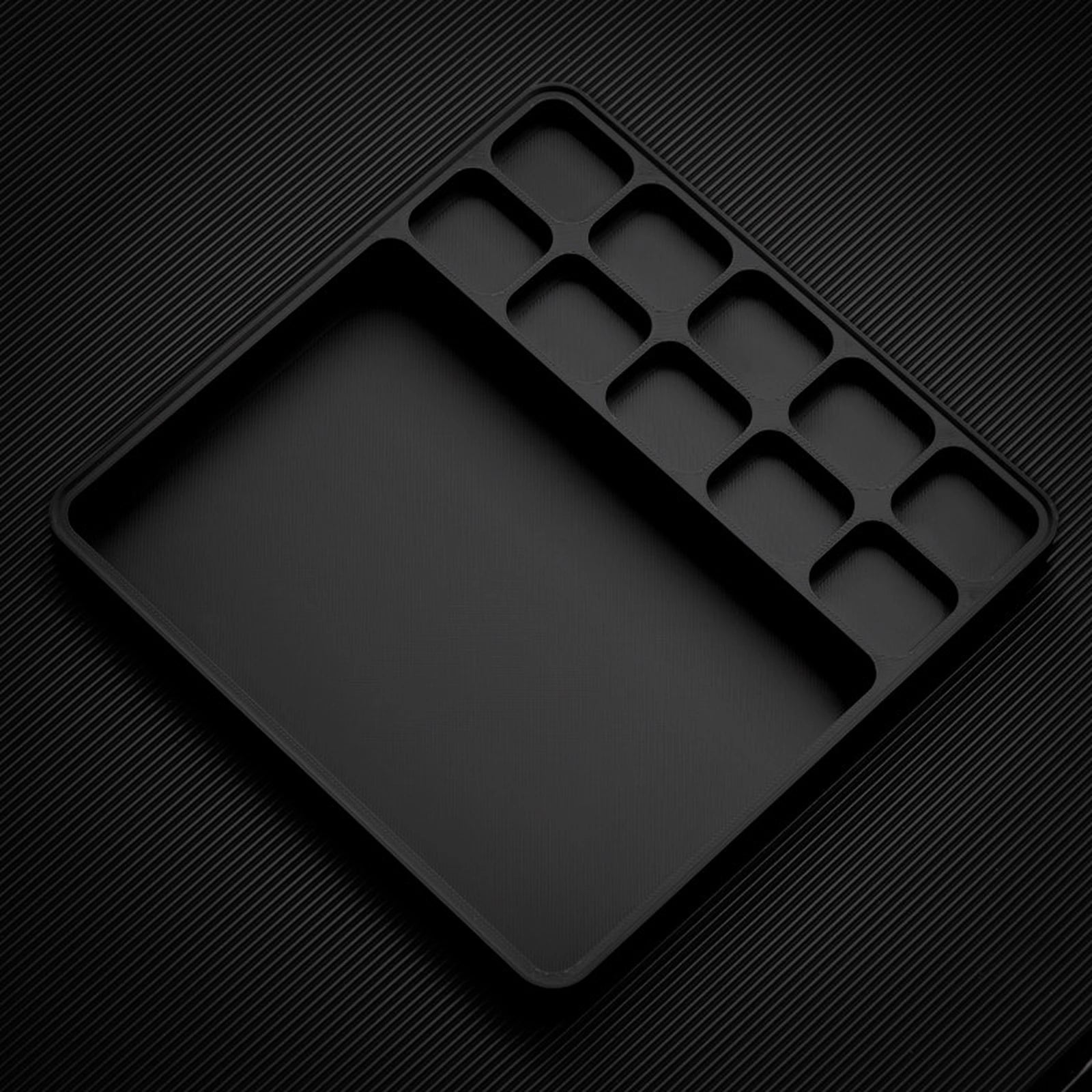 Black stackable organizer tray with 16 x 16 workbench layout