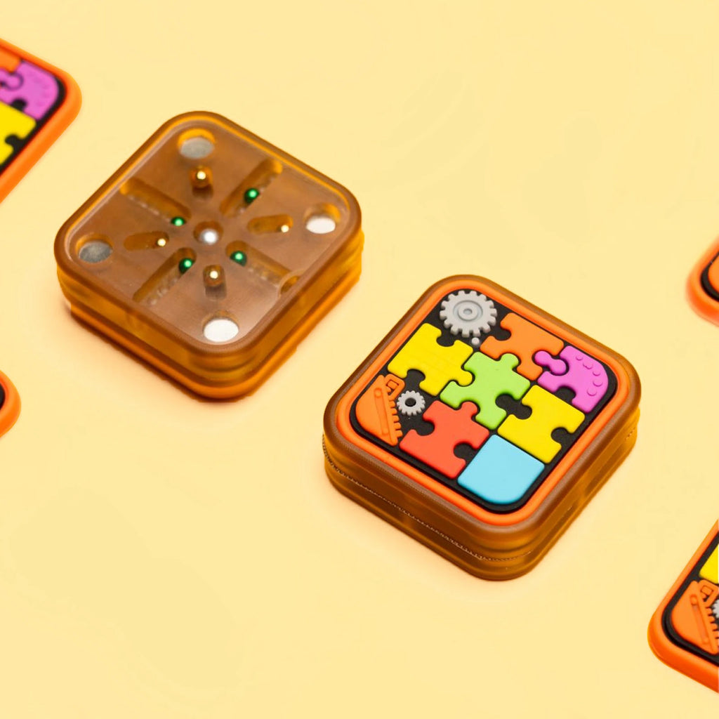 Magnetic fidget slider front and eight-track rear layout