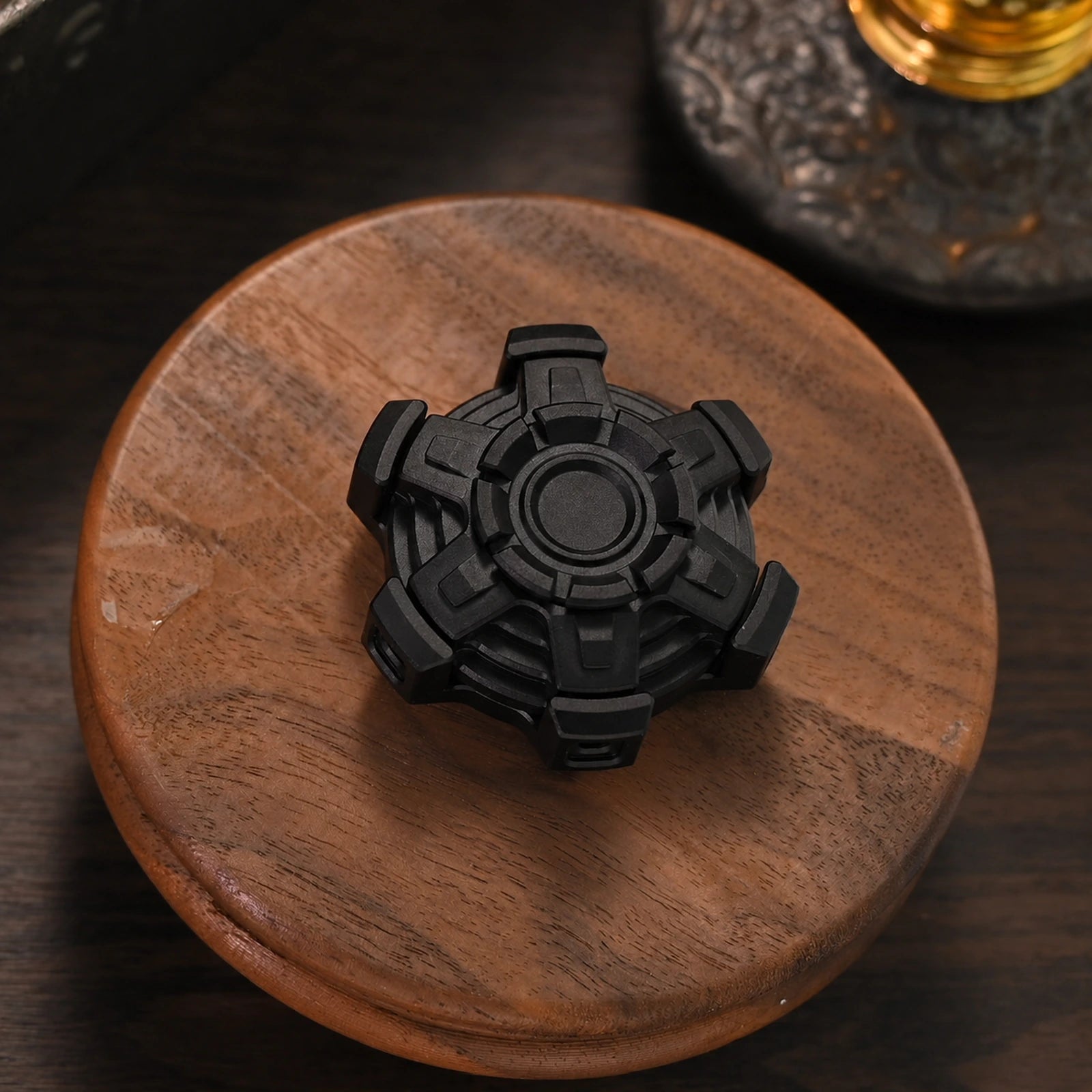 Black aluminum mechanical linkage fidget spinner variant